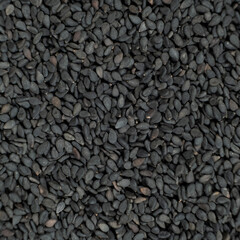 Whole black sesame seeds top view detailed shot