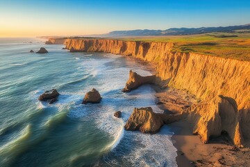 Obraz premium Scenic coastal landscape with cliffs, ocean waves, sunset reflection, serene nature view, travel destination, outdoor adventure, beautiful seascape.