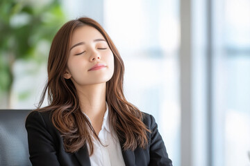 Fototapeta premium young business woman relaxing at office