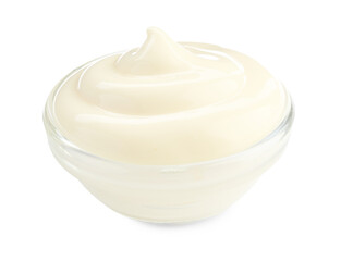 Tasty mayonnaise sauce in bowl isolated on white