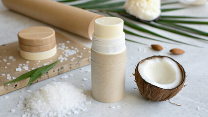 Natural Beauty Products Display with Coconut and Sea Salt on Marble Surface