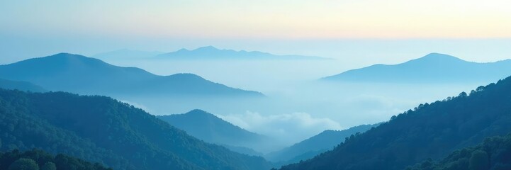 Fototapeta premium Soft blue fog rolling over the hills with fluffy white clouds, landscape, atmospheric