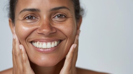This image features a person using skincare products, showcasing their face with joyful expression, suggesting an ad or promotion of personal care.