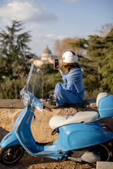 A traveler captures a scenic view of St. Peters Basilica in Vatican City from a high vantage point...