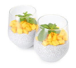 Delicious chia pudding with mango and mint in glasses isolated on white
