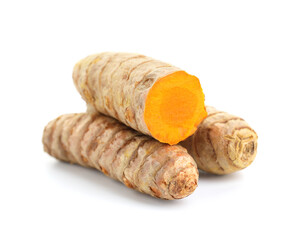 Whole and cut turmeric roots isolated on white