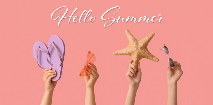 Female hands with stylish sunglasses, flip flops and starfish on pink background
