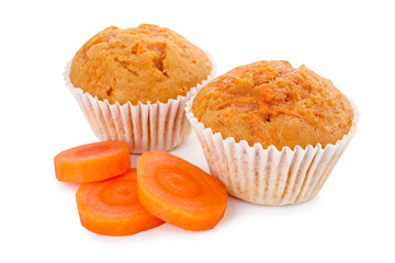 Tasty sweet carrot muffins and cut vegetable isolated on white