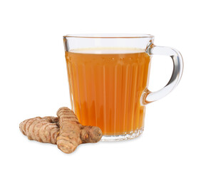 Aromatic turmeric tea in glass cup and roots isolated on white