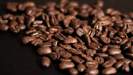 Arabica Coffee Beans Maragogipe on a Black Background. Elephant Beans