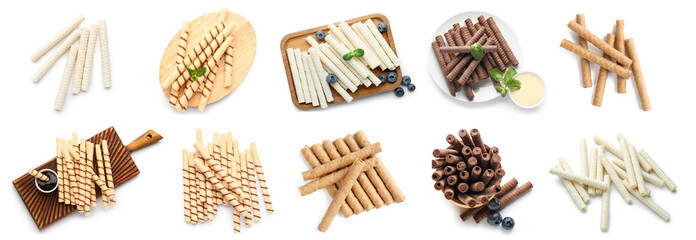 Collage of tasty wafer rolls isolated on white background, top view