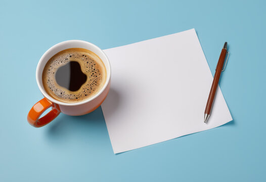 A cup of coffee and a blank blank sheet of paper