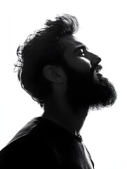 silhouette of a young bearded man