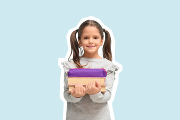 Cute little happy girl with pencil case and books on blue background