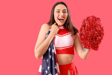 Female cheerleader with USA flag on red background