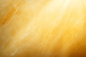 Smooth golden marble with delicate veining forms a lavish background that enhances any composition, featuring soft lighting and ample copy space for text