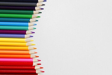 Colored pencils on a white background
