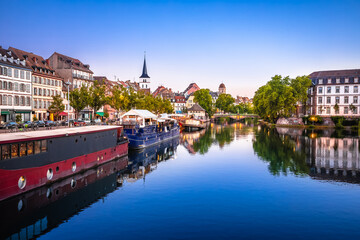 Fototapeta premium Town of Strasbourg canal and historic architecture evening view