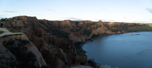 Barrancas Canyon: Eroded Cliffs and Reservoir
