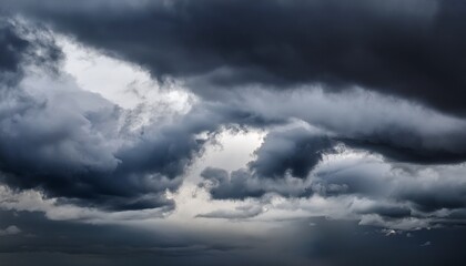 Obraz premium Moody overcast sky background, fleecy clouds texture, ominous skies in cold windy weather