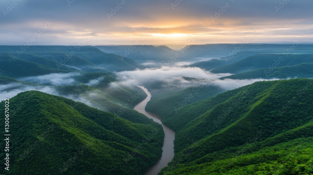 Aufkleber misty mountain range unfolds at dawn, with a river winding through a lush valley bathed in soft gold