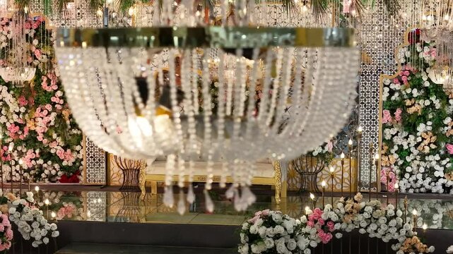 Royal Wedding Setup: Drone Reveals Sparkling Chandeliers, Gold Sofa & Flower Walls on Reflective Glass Floor