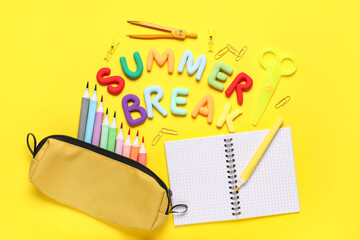 Text SUMMER BREAK and different stationery on yellow background. Top view
