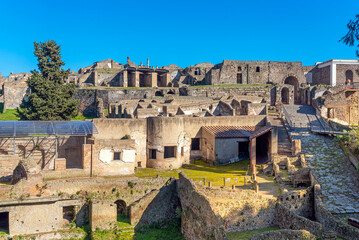 View of the main entrance to the historic city of Pompeii with the Marina Gate and the suburban baths adjacent to the ancient city walls.