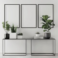 Minimalist interior design with three empty frames. a glass console table. and potted plants