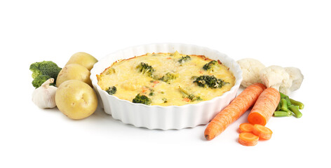 Delicious vegetable casserole and ingredients isolated on white