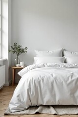 Bed in minimalist Scandinavian bedroom with white linens and pillows, king size bed, simplicity