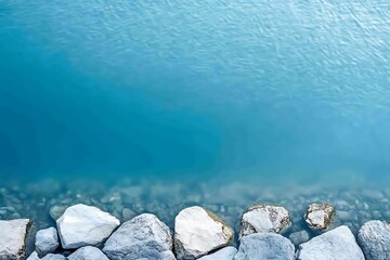 Serene Coastal Scene Clear Blue Water and Smooth Stones