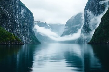 Serene Fjord Landscape Misty Mountains and Calm Waters