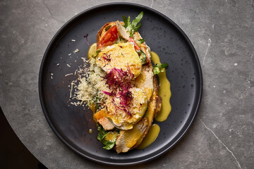 Gourmet Chicken Sandwich Top View with Fresh Vegetables, Melted Cheese, Garnished with Herbs on Elegant Plate, Close-Up Food Presentation Concept