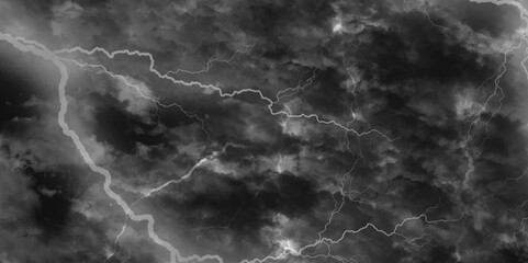 Thunder, lightnings and rain on a stormy summer night in black and white. Lightning bolts in the sky at night. 
