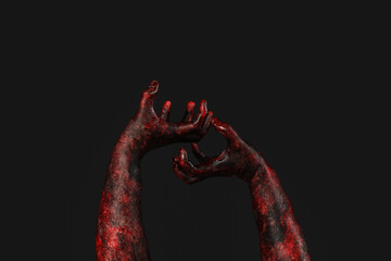 Hands of zombie on black background. Halloween celebration