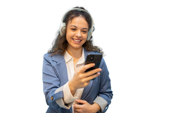 Smiling businesswoman wearing headphones using smartphone with transparent background