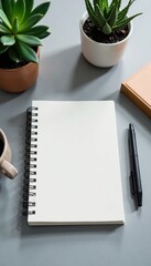 A single blank journal on a minimalist grey desk, journal, desk, paper