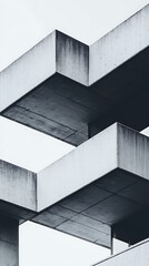 Obraz premium Concrete building detail with intersecting beams, sky background