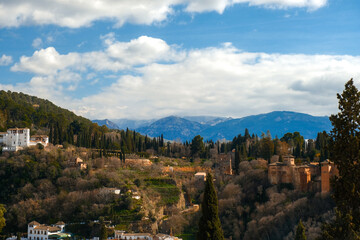 Obraz premium The sea and mountains are landscaped with clouds and sunny weather. Mirador de Cerro gordo