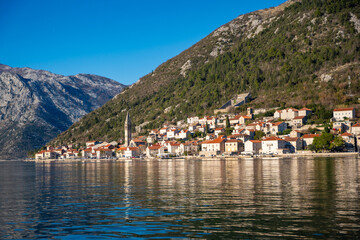 Fototapeta premium Panorama view of the historic town at famous Bay of Kotor with boats in winter time
