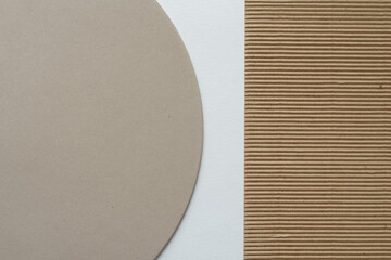 circular millboard shape and corrugated paper on white