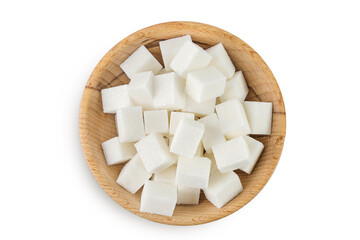 Sugar cubes in a wooden bowl isolated on white background. Top view. Flat lay