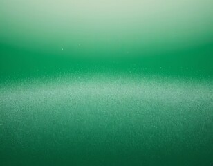 A calming gradient of deep green hues creating a serene abstract background.