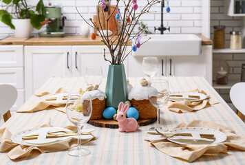 Table setting with bunny for Easter celebration. Closeup
