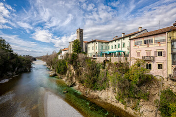View of Cividale del Friuli facing on the Natisone river. Beautiful Italian cityscape of a medieval town. Udine province, Friuli Venezia Giulia, Italy.