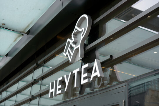 exterior building facade detail and sign of HEYTEA, a bubble tea store, located at 505 Yonge St in downtown Toronto, Canada