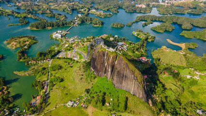 Aerial View of Guatape Rock Surrounded by Lush Greenery and Scenic Lakes in Antioquia, Colombia