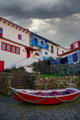 Tazones, Asturias, Spain. This beautiful fishing village has been declared a historic site. It...