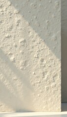 Fototapeta premium Rough-textured beige paint, grey tone, undulating high-rise wall , painted wall, architecture